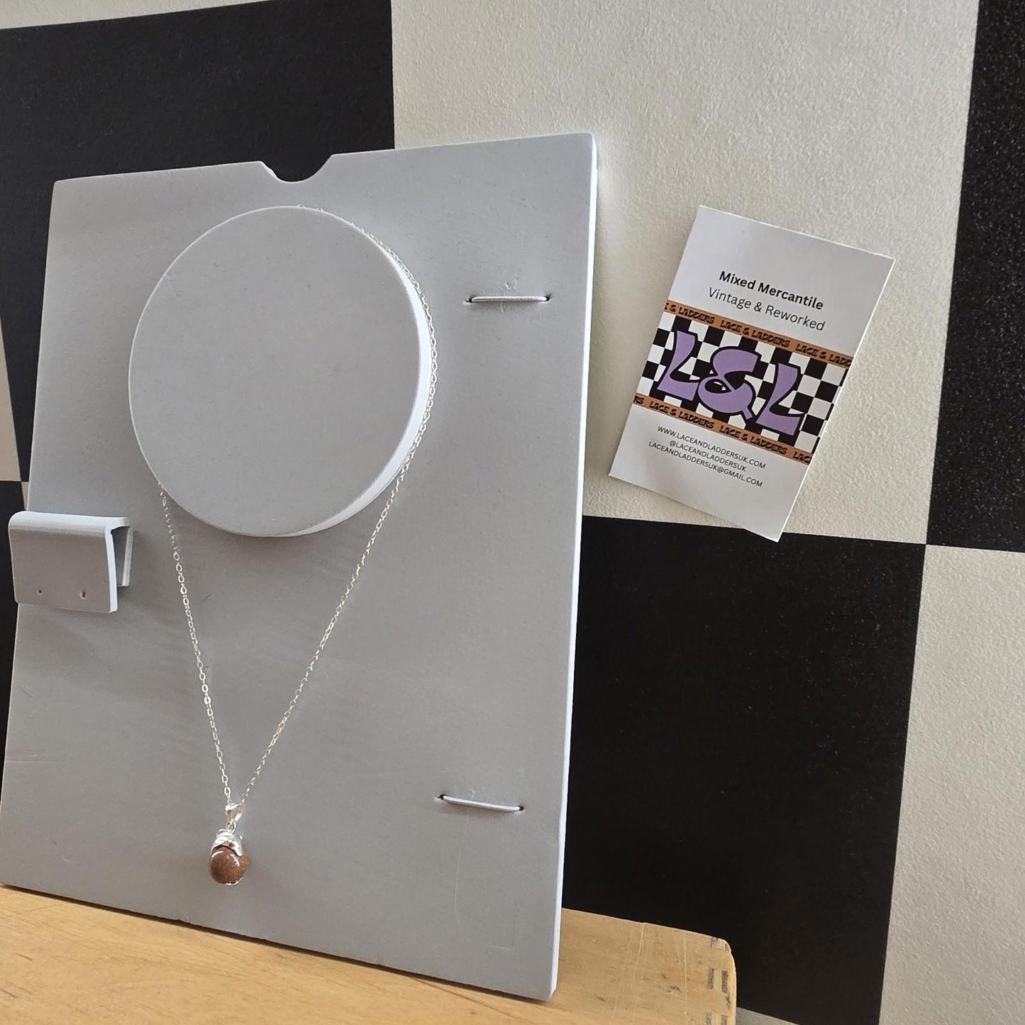 Sterling Silver Goldstone Oval Pendant with Sterling silver dolphin vintage