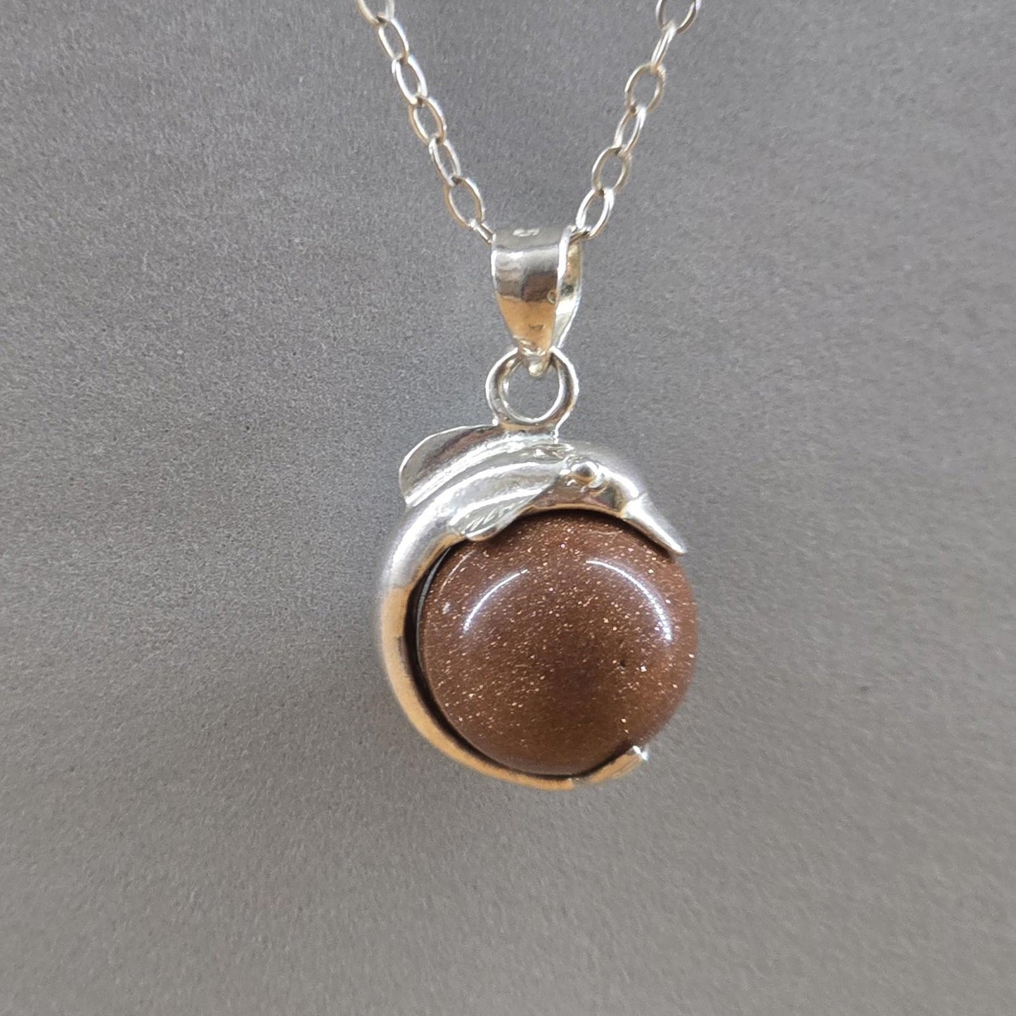 Sterling Silver Goldstone Oval Pendant with Sterling silver dolphin vintage